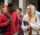 Group of diverse young adults walk to class