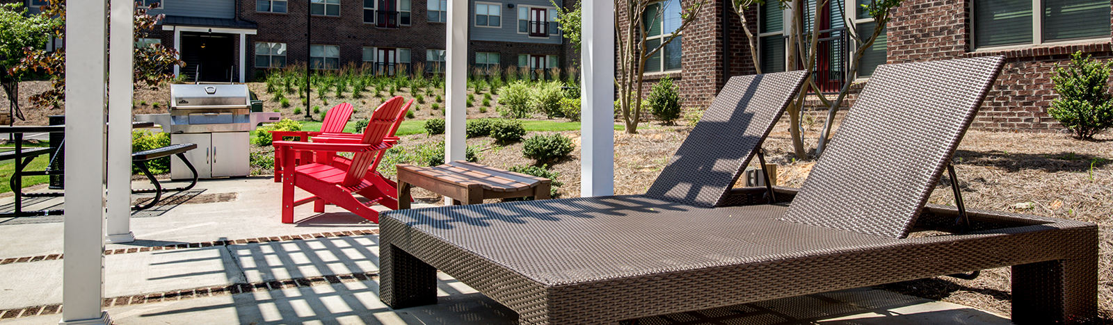 Outdoor lounge featuring a grilling station